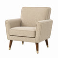 Fauteuil en tissu avec pieds en bois et embouts métalliques, beige